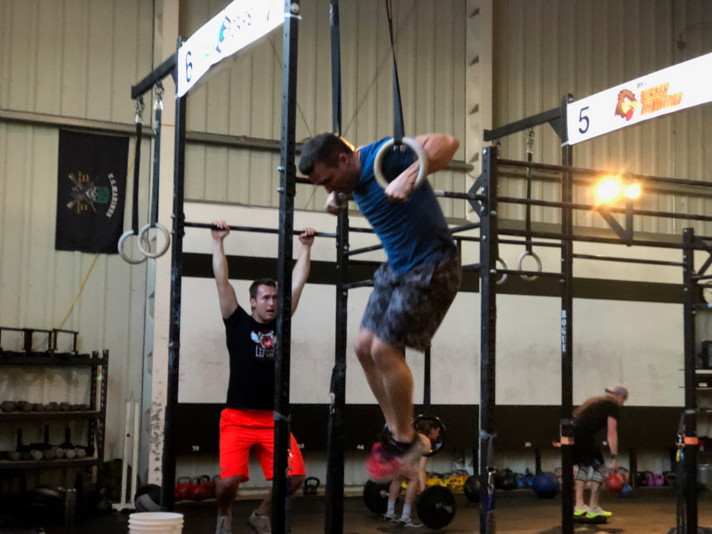 The Quick Guide to Ring Versus Bar Muscle Ups